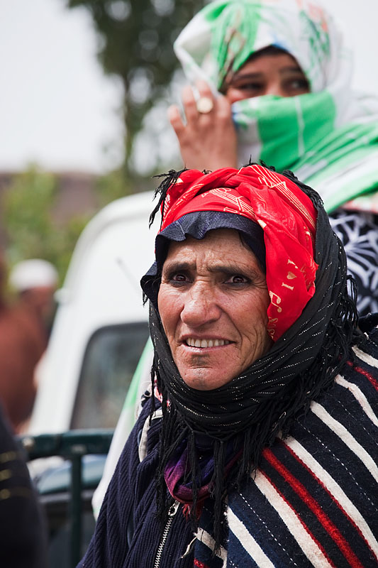   Which way to go   old woman seeking a safe place when a flood stream sweep the Imilchil market   Morocco